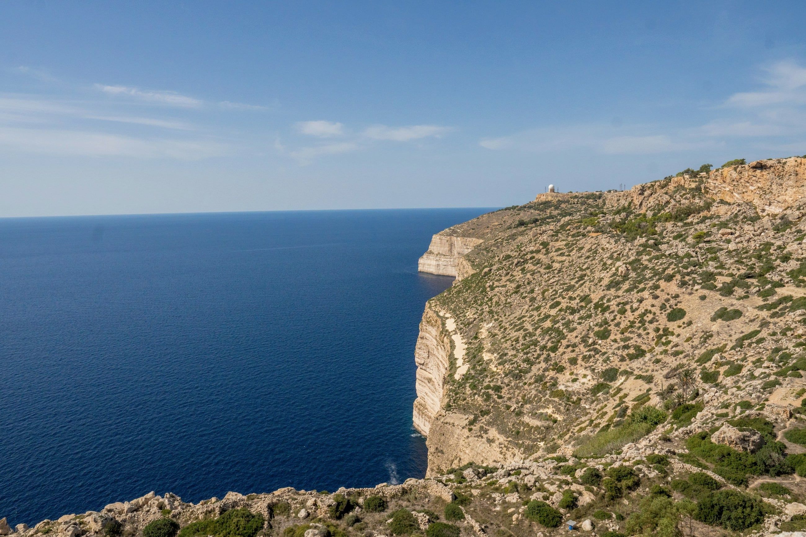 Dingli cliffs dropping into a deep blue sea